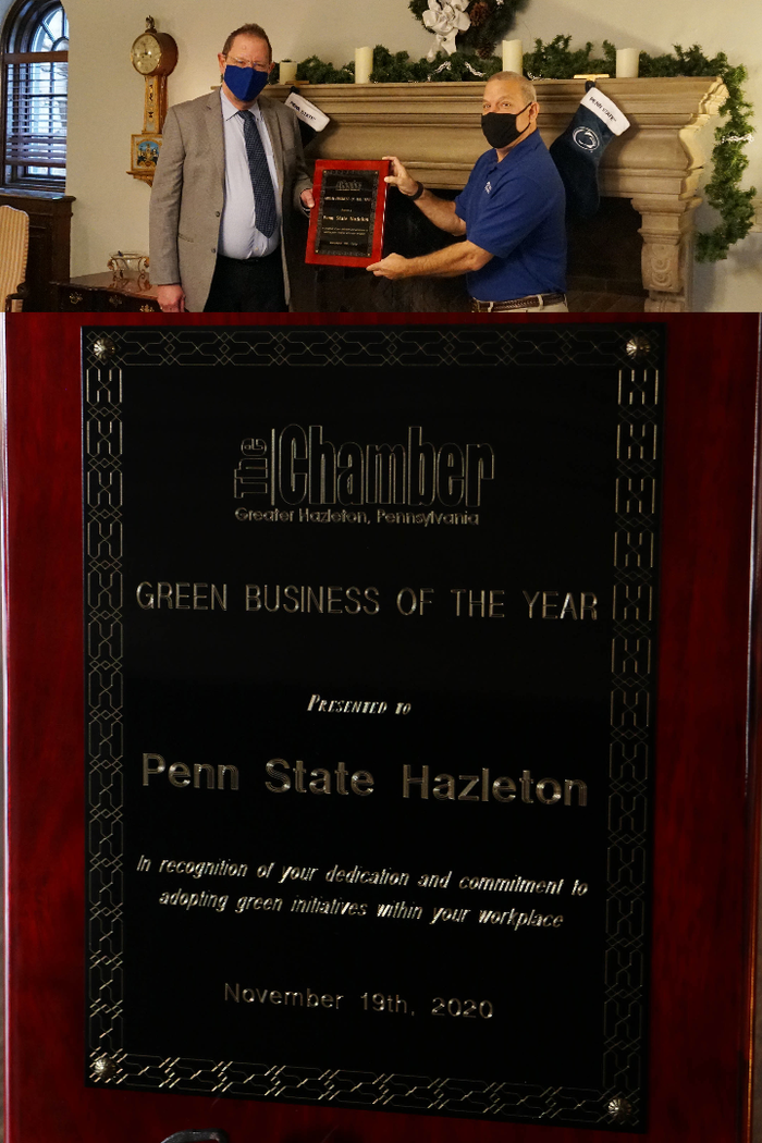 Plaque noting Penn State Hazleton as Green Business of the Year for 2020 with Chancellor Lawler accepting award.