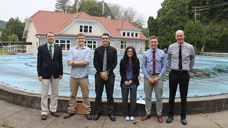 Assistant Professor of Engineering Joseph Ranalli, James Dotzel, Steven Principe, Cassandra Kelly, Justin Shimko and Assistant Professor of Engineering William Yourey stand in front of Bellefonte's historic Big Spring.