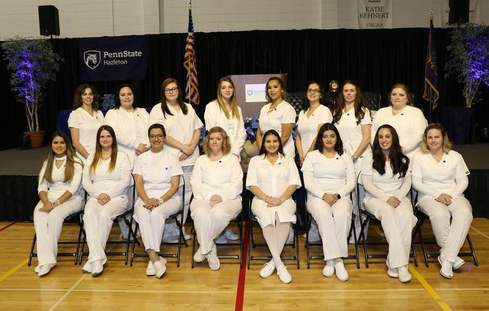 Practical Nursing graduates seated in two rows