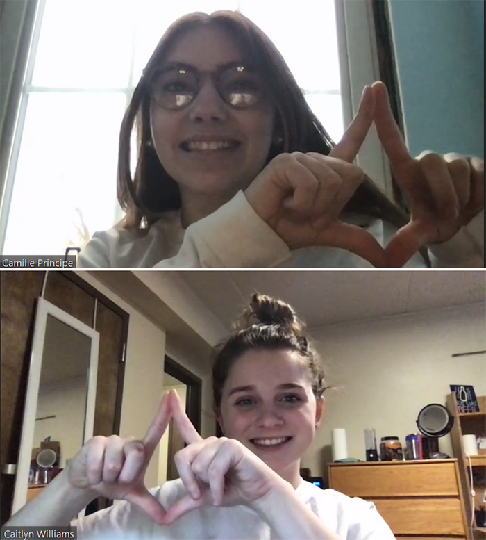 Students on Zoom call using hands to make diamond symbol