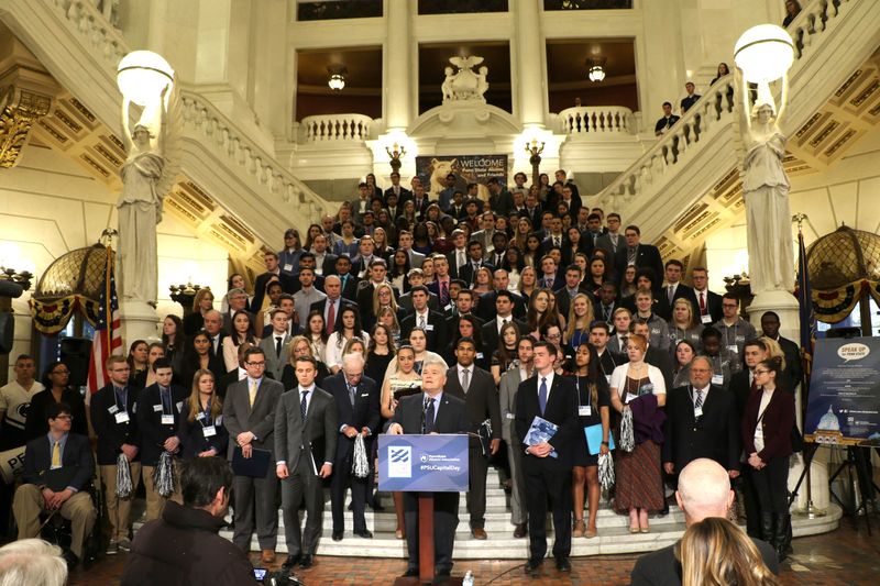 Penn Staters rally in the Capitol rotunda to show their support for the University.