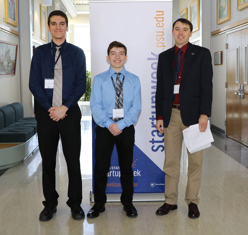 From left, Andre Stafiuc and Jackson Arms from the Hazleton Area Academy of Sciences were recognized by Dr. Joseph Ranalli for taking second place in the STEM fair. 
