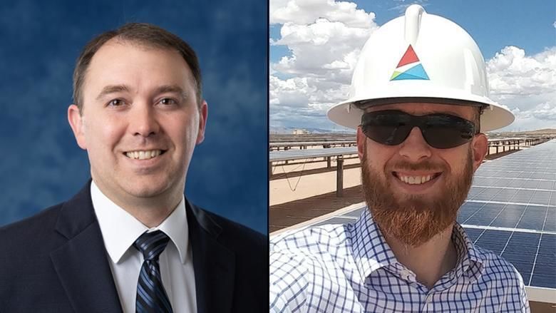 A smiling man in a suit and a smiling man in a hard hat and sunglasses. 