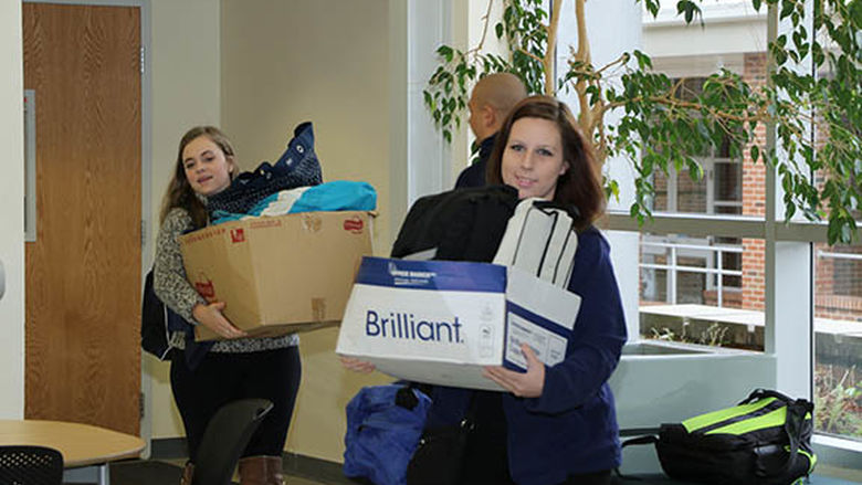 Students carry the donated bags from Penn State Hazleton to take to Brandon's Forever Home.
