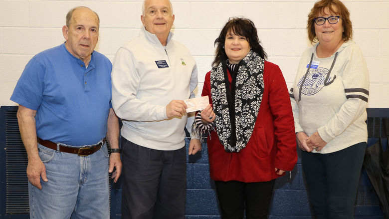Members of the Greater Hazleton Chapter of the Penn State Alumni Association presented a check in support of a blood drive recently held at Penn State Hazleton.