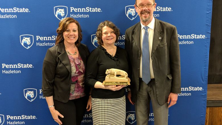 Debra Jemo, center, who recently retired after 16 years as a counselor at the campus, was honored during the event.