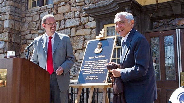 University benefactor Pasco Schiavo, right, has endowed the Pasco L. Schiavo Open Doors Scholarship. Chancellor Gary Lawler is at left during the naming of the Penn State Hazleton administration building in Schiavo's honor in 2014.