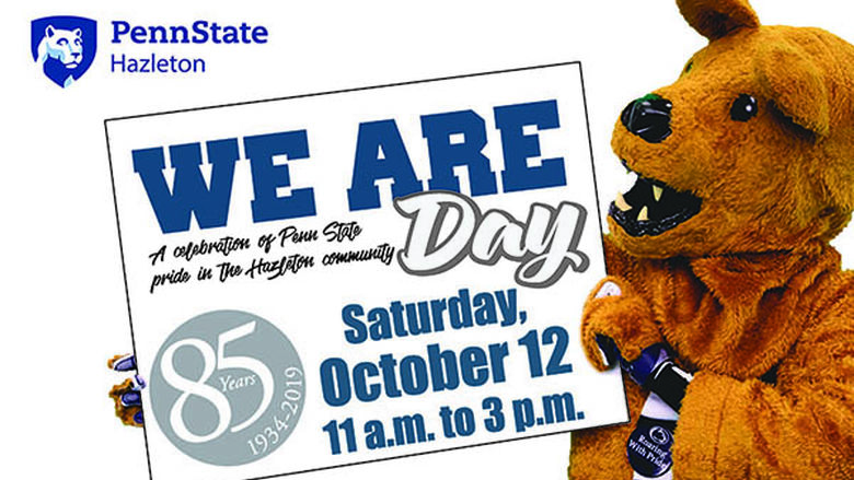 Costumed Nittany Lion holding a sign with We Are Day, Saturday, October 12 from 11 a.m. to 3 p.m.