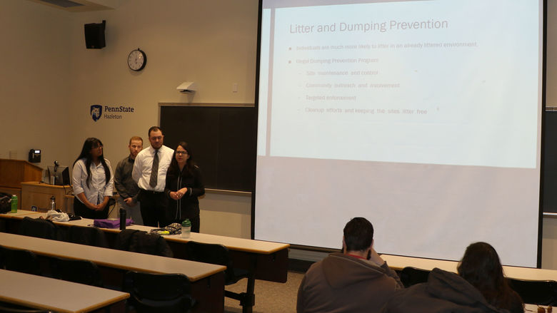 Engineering students, from left, Mari Magabo, David Bonczek, Derek Geake and Raiana Nichols present their research project proposal. 