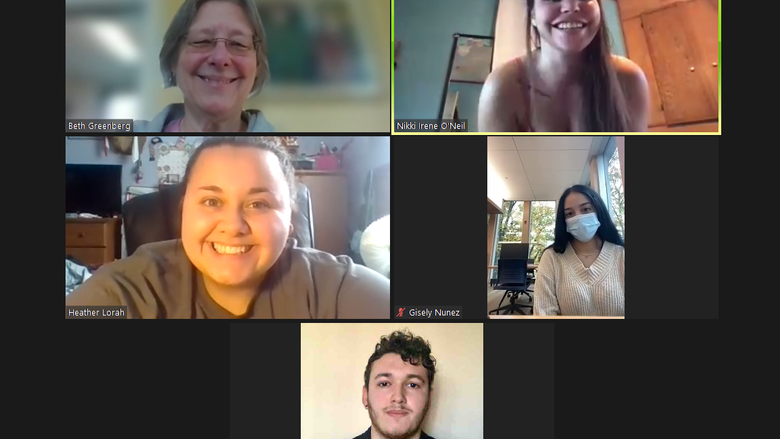 Five people including students and an instructor smiling during a Zoom chat.