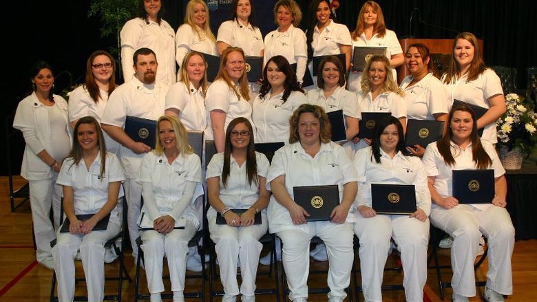 Practical Nursing Class of 2014 posing in three rows.