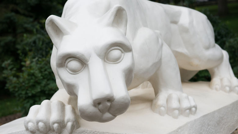 a closeup, head-on image of the iconic Penn State lion shrine at the Schuylkill campus