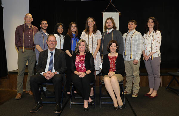 Alpha Sigma Lambda inductees at Penn State Hazleton Group photo of 11 people, three sitting and eight standing.