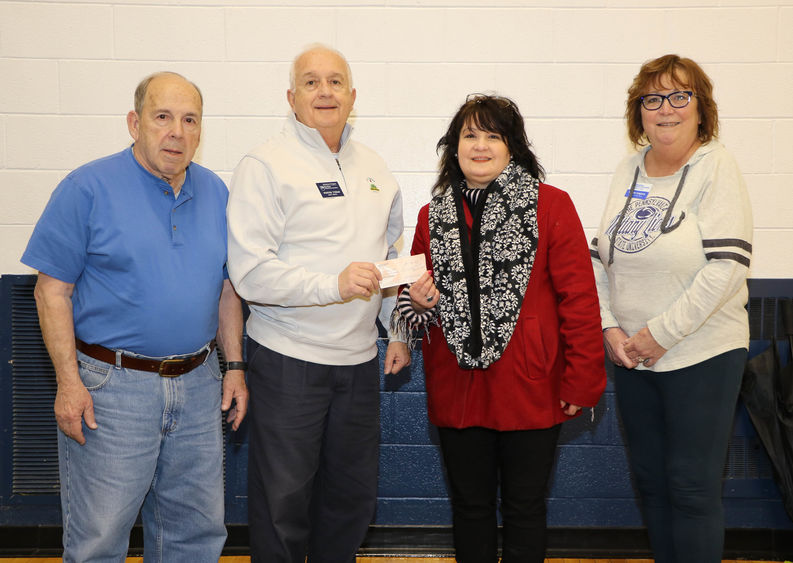 Members of the Greater Hazleton Chapter of the Penn State Alumni Association presented a check in support of a blood drive recently held at Penn State Hazleton.