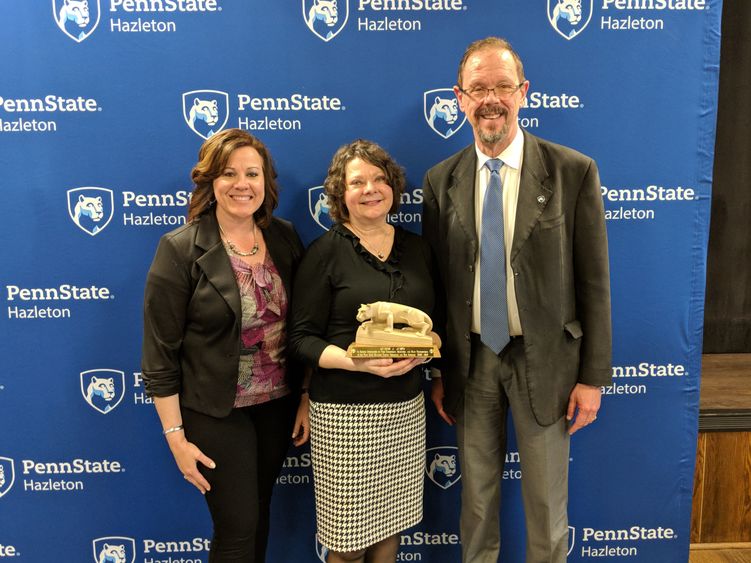 Debra Jemo, center, who recently retired after 16 years as a counselor at the campus, was honored during the event.