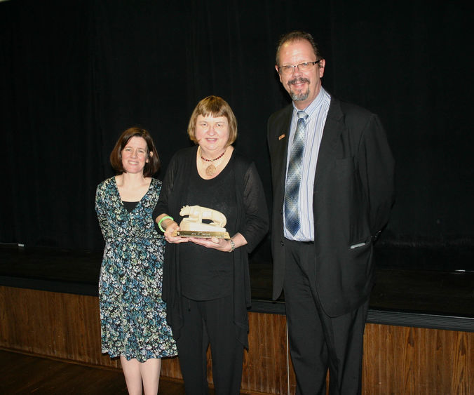 Senior instructor in English Jane Waitkus, center, recently retired from Penn State Hazleton. At left is Director of Academic Affairs Elizabeth Wright and at right is Chancellor Gary Lawler.