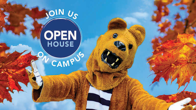 Nittany Lion with arms outstretched surrounded by fall foliage.