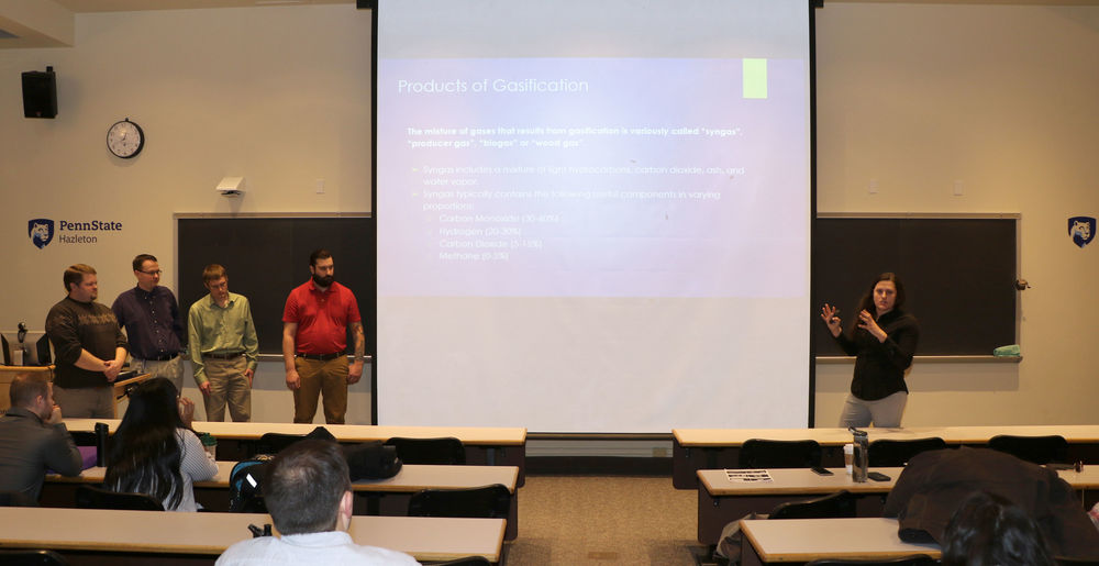Engineering students, from left, Dan Lanphear, Steven Baksa, Aleksander Everett, Albert Kauker and Megan Pandolfelli present their research project proposal.