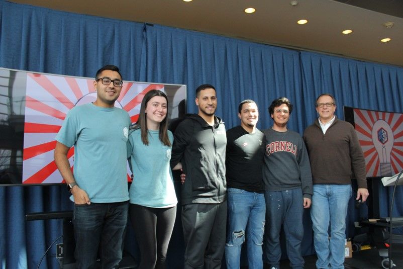 Mayank Makwana, HackPSU co-executive director; Kelsie McElroy, HackPSU co-executive director; Gabriel Ynoa; Josiel Delgadillo; Nicolas Salomon and Michael Kubit, Penn State vice president for information technology and chief information officer.